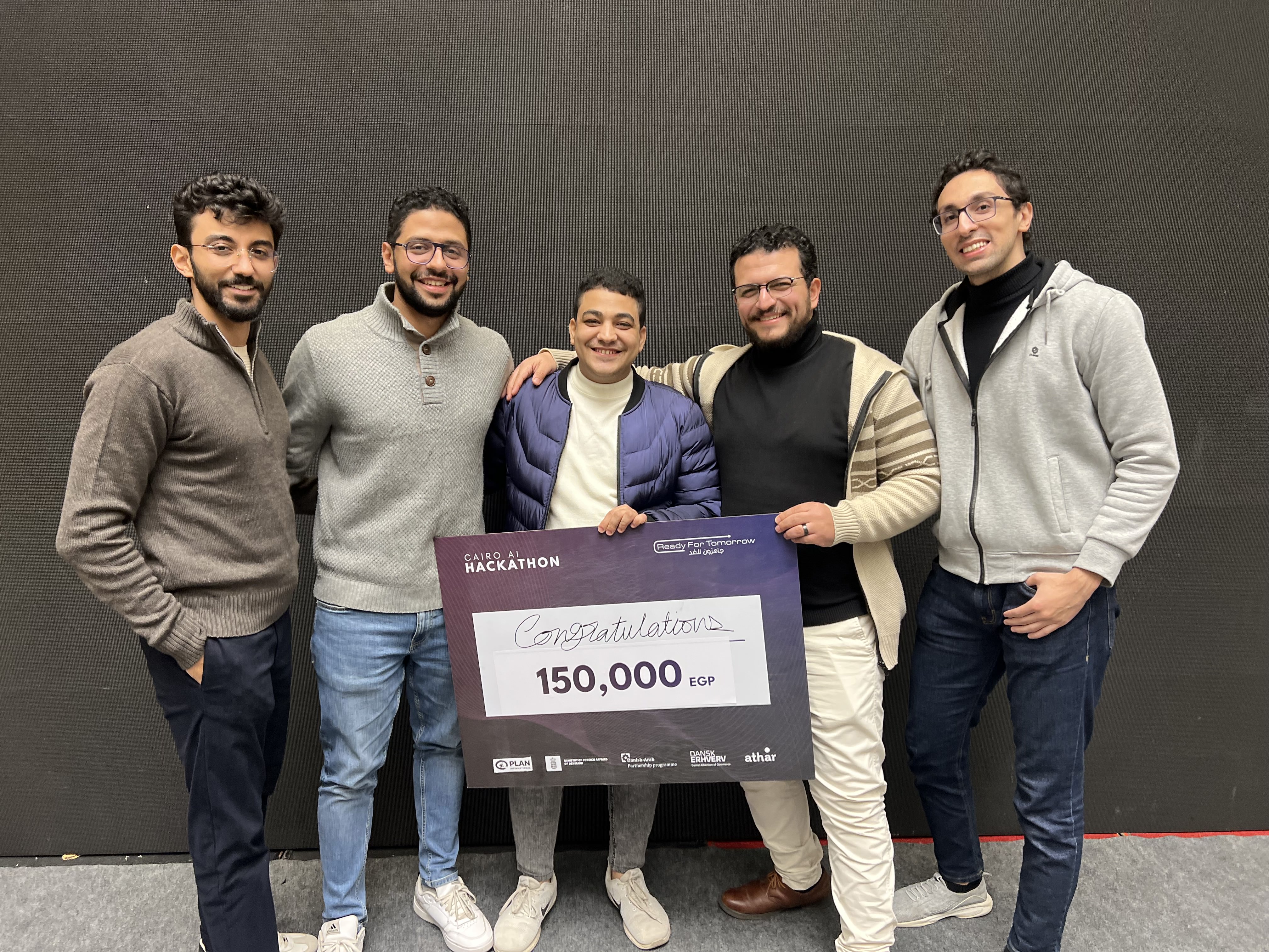 OQmega Team members during the Cairo AI Hackathon event