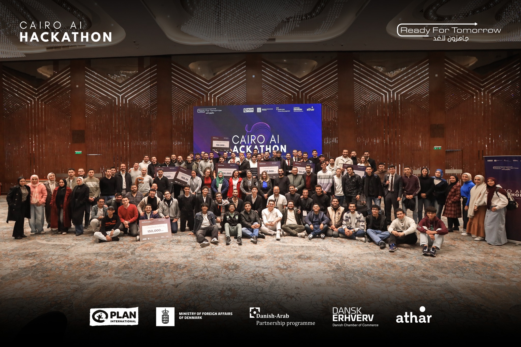 Hackathon moment featuring the OQmega Team and OQgen project